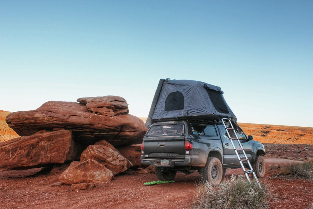 Truck with popup tent on cover