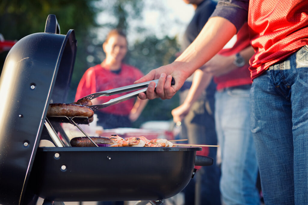 How to tailgate with a truck and charcoal grill